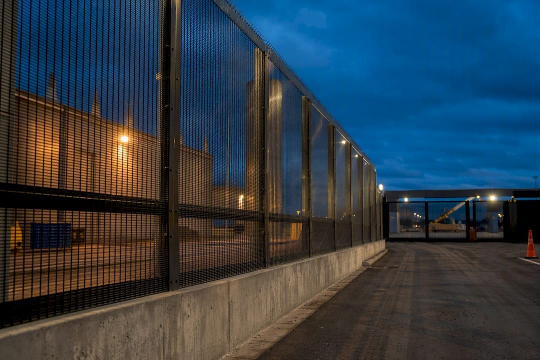 Security fencing around an active construction perimeter