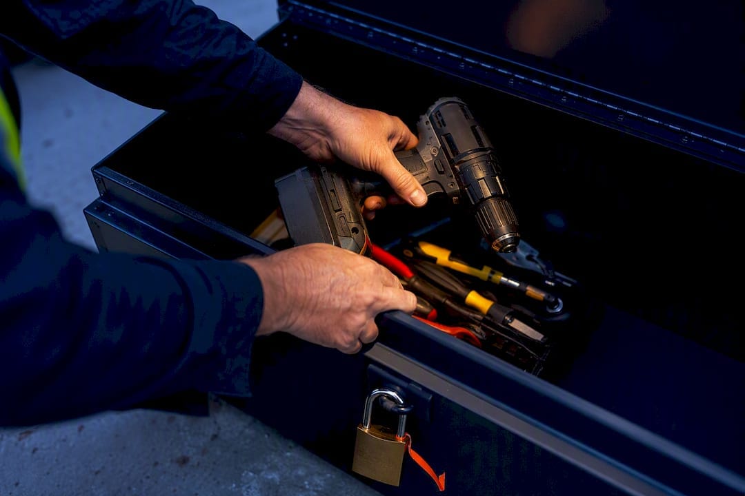 Worker securing tools in locked storage