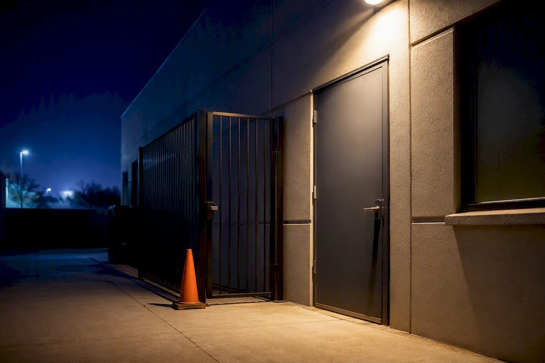 Motion light illuminating a commercial side entrance