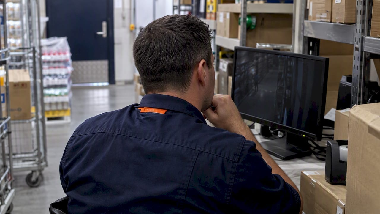 Manager reviewing retail shrink incident footage