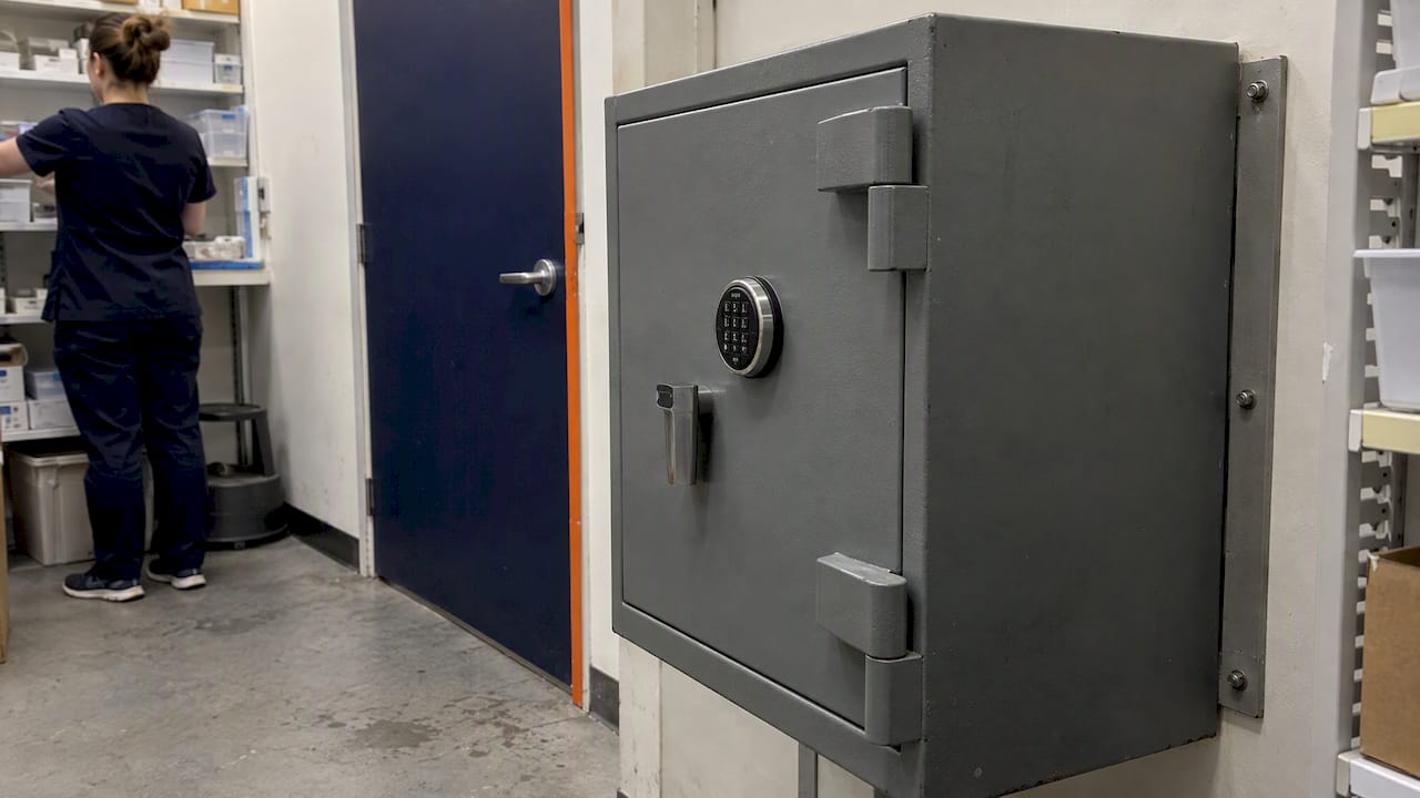 Steel medicine safe secured in pharmacy storeroom